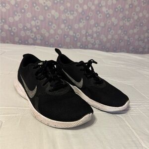 Nike Black Mesh Sneakers with White Swoosh